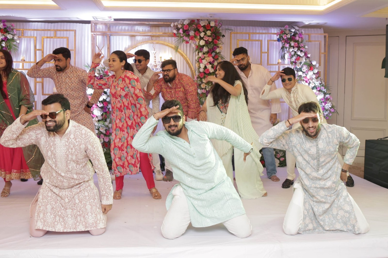 Groom's friends performing a choreographed sangeet dance